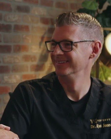 Dr. Ryan Jones, smiling, on the Vein Envy interview set.